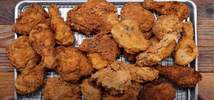 crispy fried chicken on aluminum pan