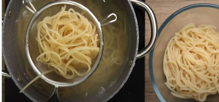 draining pasta