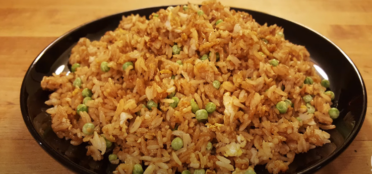 hibachi fried rice on a black plate