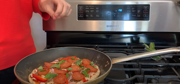 reheating pizza on a stovetop