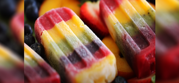 close up shot of a rainbow popsicle