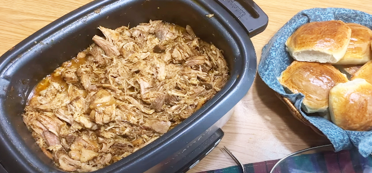 slow cooked meat with bread on the side