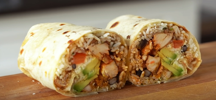 burrito on top of wooden board