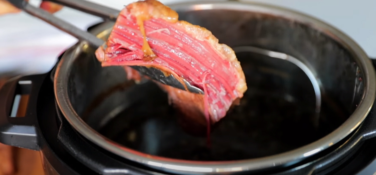 cooking corned beef on a pot