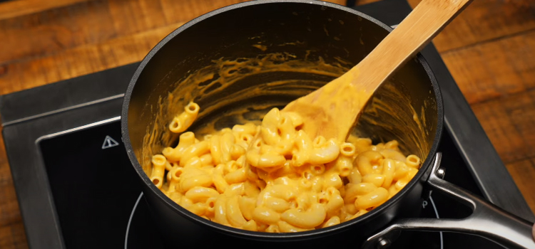 cooking mac and cheese on a pot