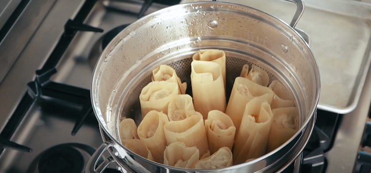 cooking tamales on a pot