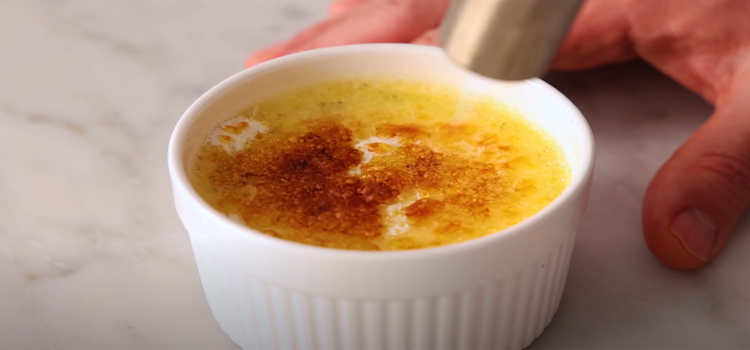 creme brulee on a white bowl