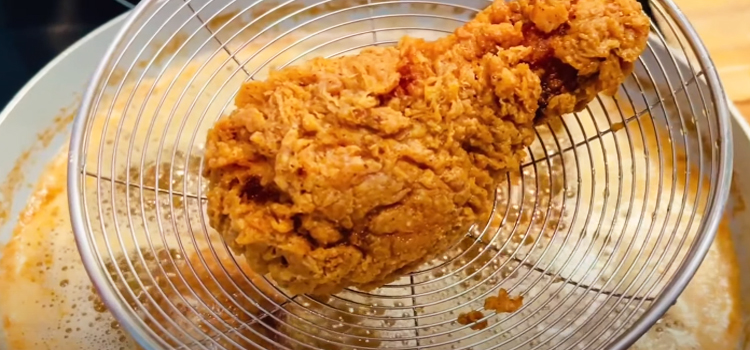 fried chicken  on a strainer