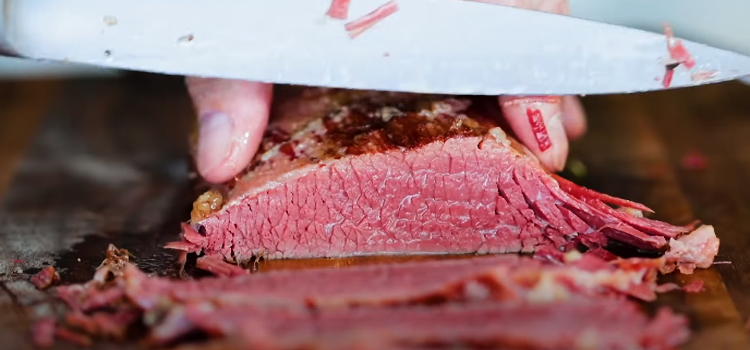 slicing homemade corned beef