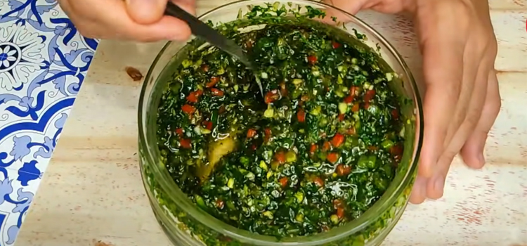 Chimichurri on a glass bowl