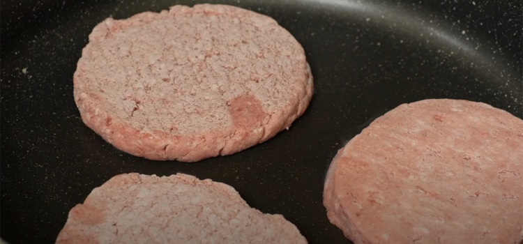 Frozen Burger Patties on a pan