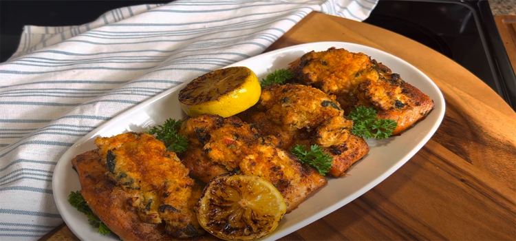 crab stuff salmon on a white  serving plate