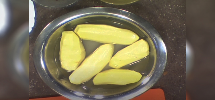 potatoes with water on a basin