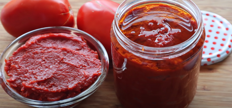 tomato paste on a bowl and jar