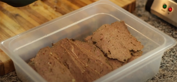 Gyro Meat Strips on a Plastic Container