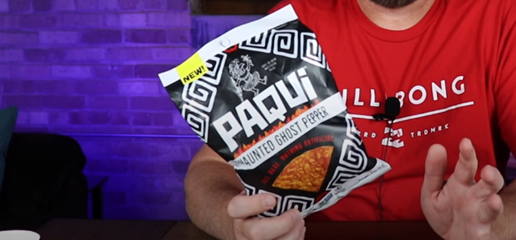 Man Holding Pack of Paqui Haunted Ghost Pepper