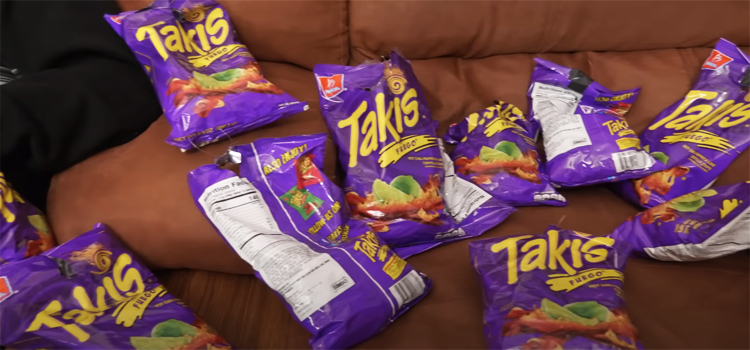 Packs of Takis on a Sofa