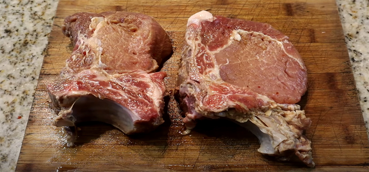 Pork Chops in a wooden board