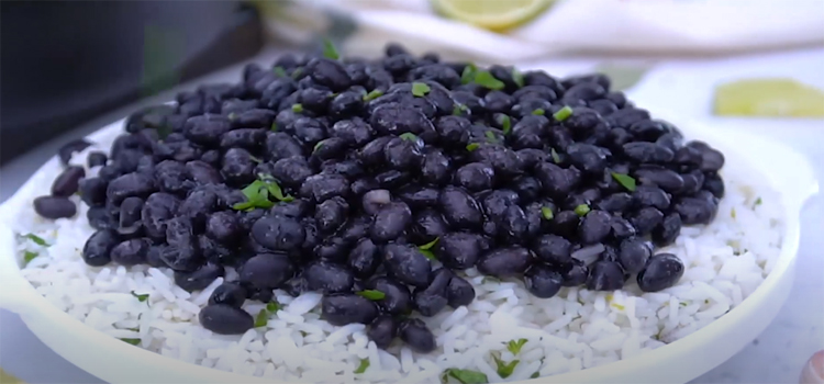 cooked Black beans on top of a rice