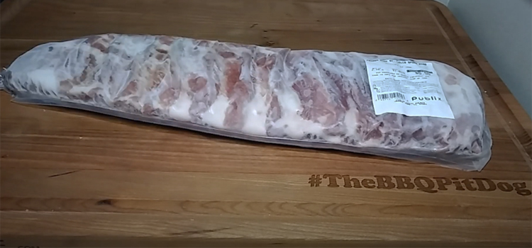 frozen ribs on a wooden board