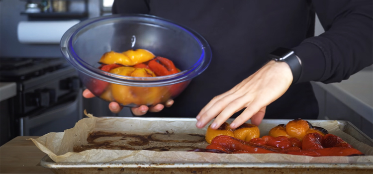 putting peppers on a bowl