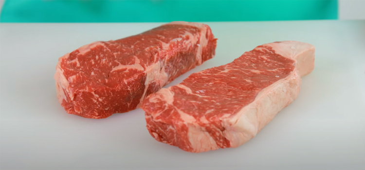 steak on a white chopping board