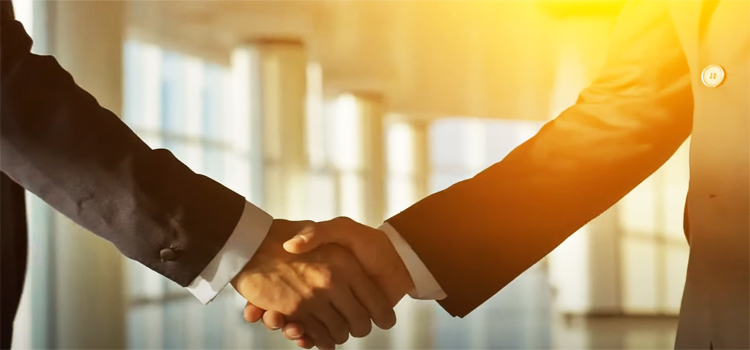 two businessmen shaking hands