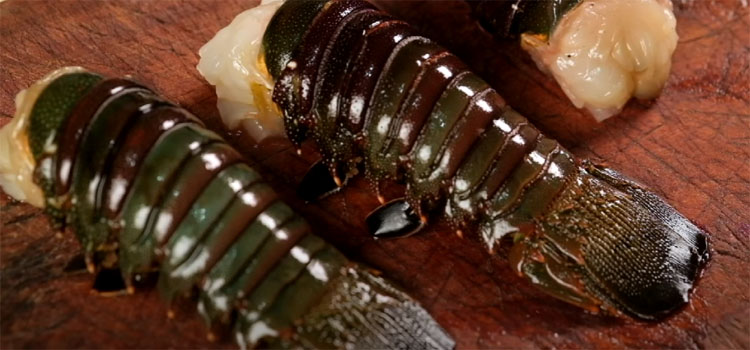 Lobster Tails on a Wooden Chopping Board