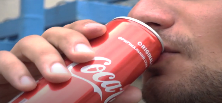 Man Drinking Cola