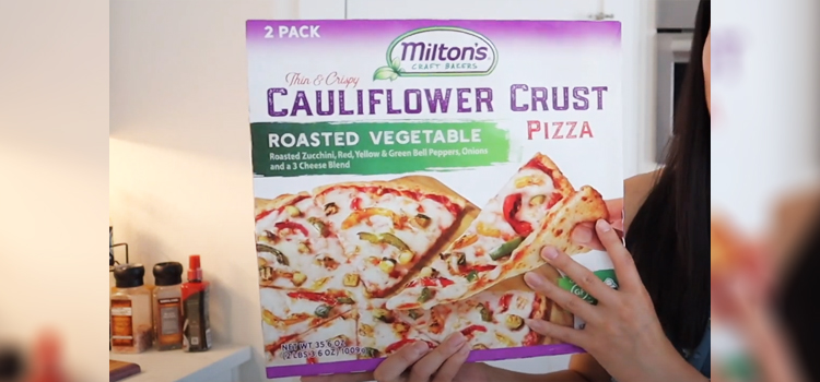 Woman Holding Box of Costco Milton's Cauliflower Pizza