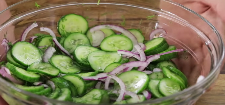 Cucumber Salad Recipe on a Glass Bowl