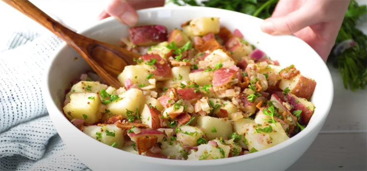 German Potato Salad on a White Glass Bowl