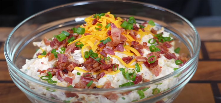 Overloaded Potato Salad on a Glass Bowl