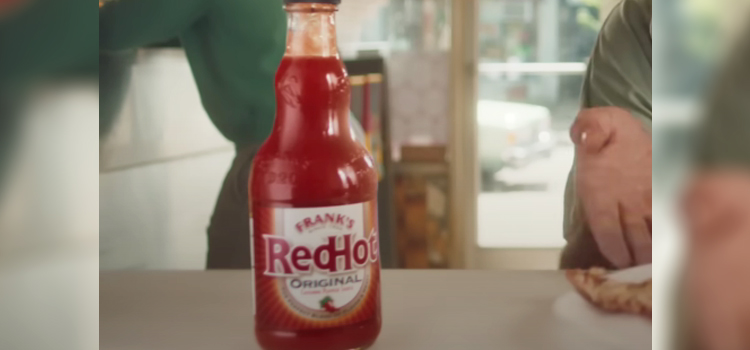 Bottle of Frank's Red Hot Cayenne Pepper Sauce on a Table