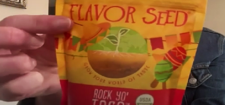 Hand Holding Flavor Seed Rock Yo Taco Seasoning