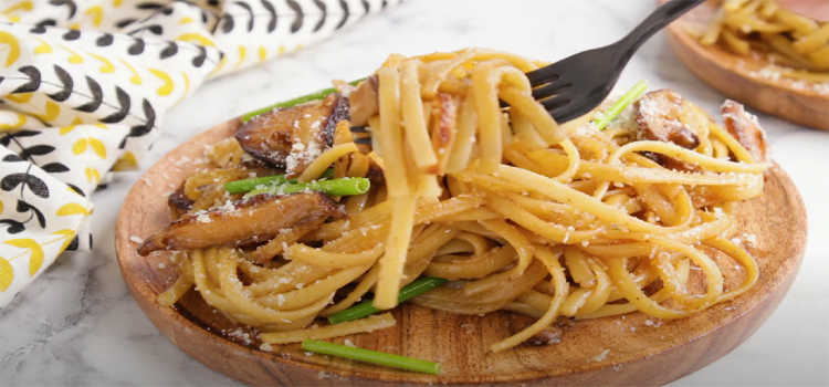 Garlic Noodles on a Wooden Plate