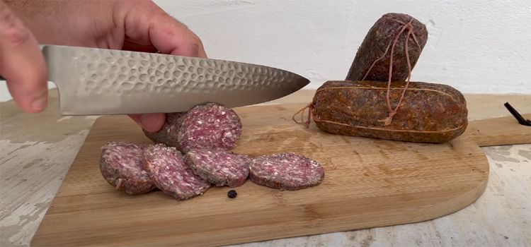 Man Slicing Salami