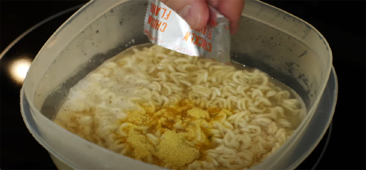 Pouring Seasoning on a Ramen