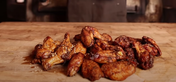 Smoked Chicken Wings on a Wooden Table