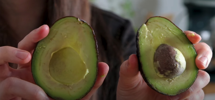 Woman Holding Avocado