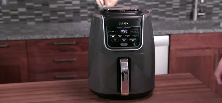 Air fryer on a Wooden Table