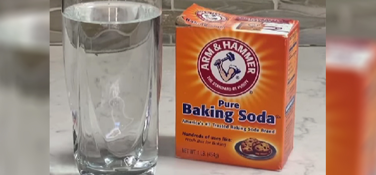 Box  of Baking Soda and a Glass