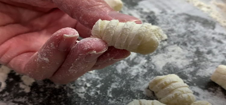 Hand Holding Potato Gnocchi