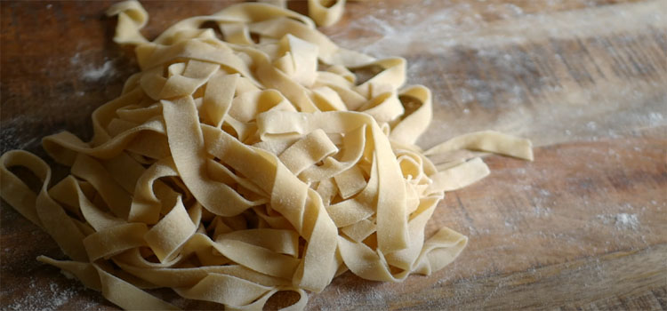 Homemade Fresh Pasta on a Wooden Board