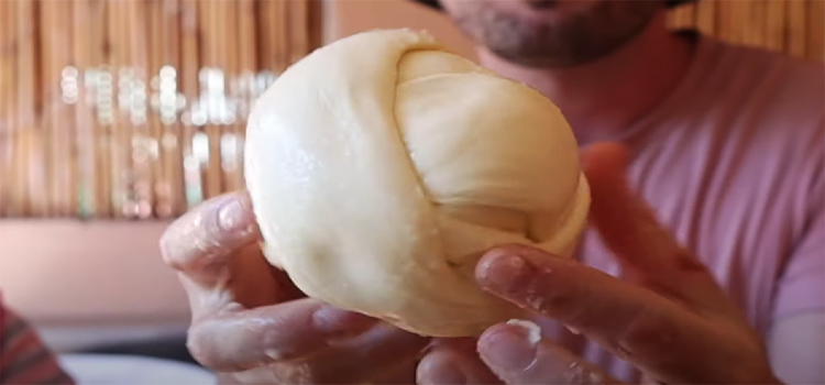 Man Holding Oaxaca Cheese