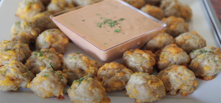 Sausage Cheese Balls with Dipping Sauce on a Plate