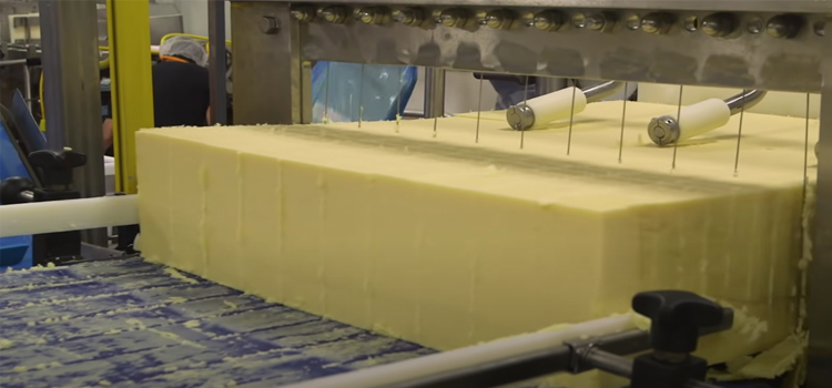 Slicing Cheese on a Machine