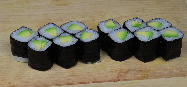 Avocado Roll on a Wooden Board