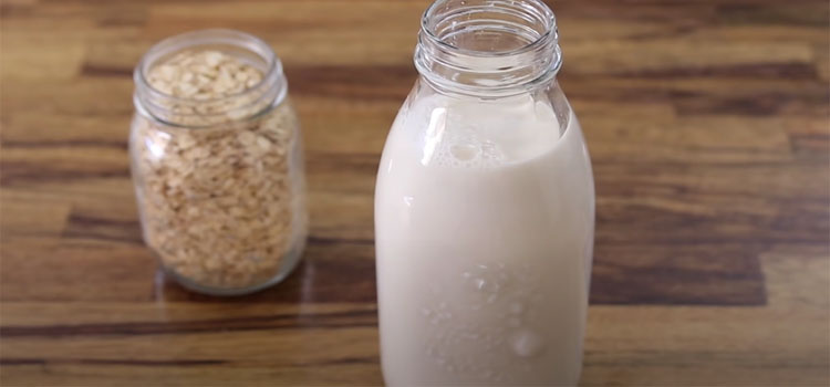 Bottle of oatmilk and oats