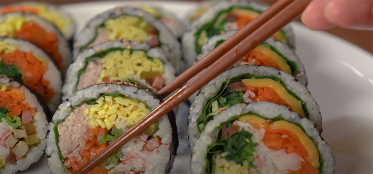 Person Eating Sushi